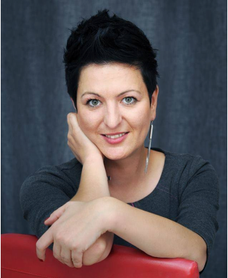 Portretowe zdjęcie Magdaleny Lesiewicz